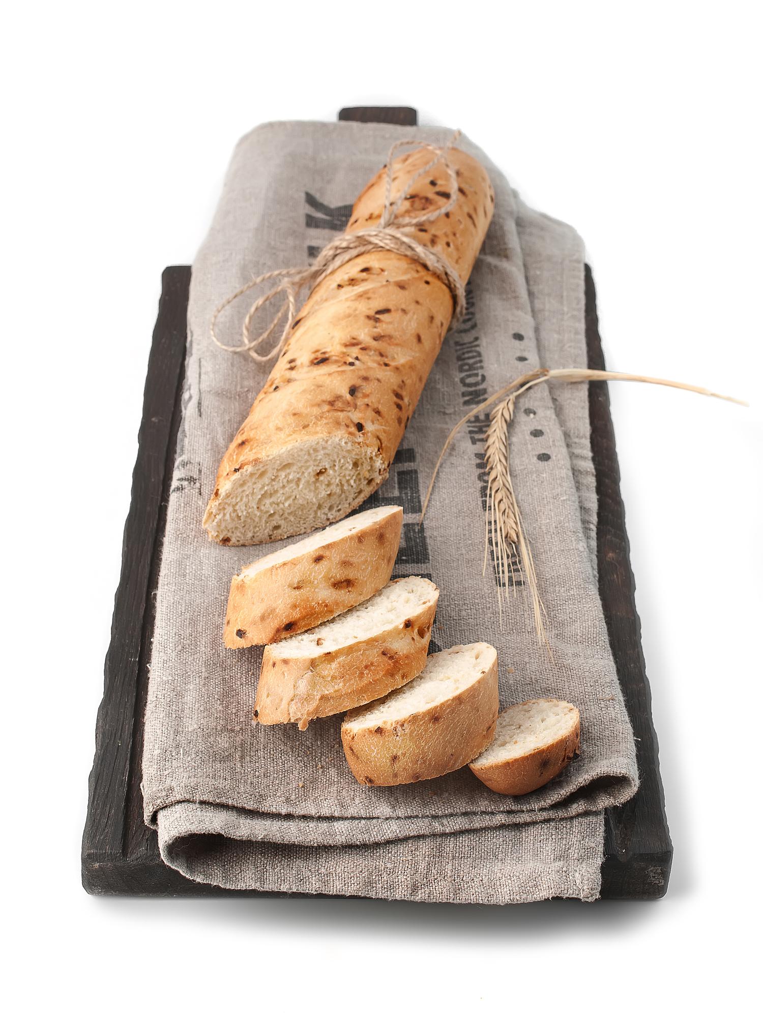 Styled artisanal loaf on paper